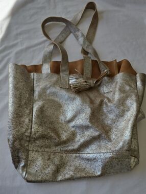 Metallic Silver Tote Bag with Tassel Accent All Leather